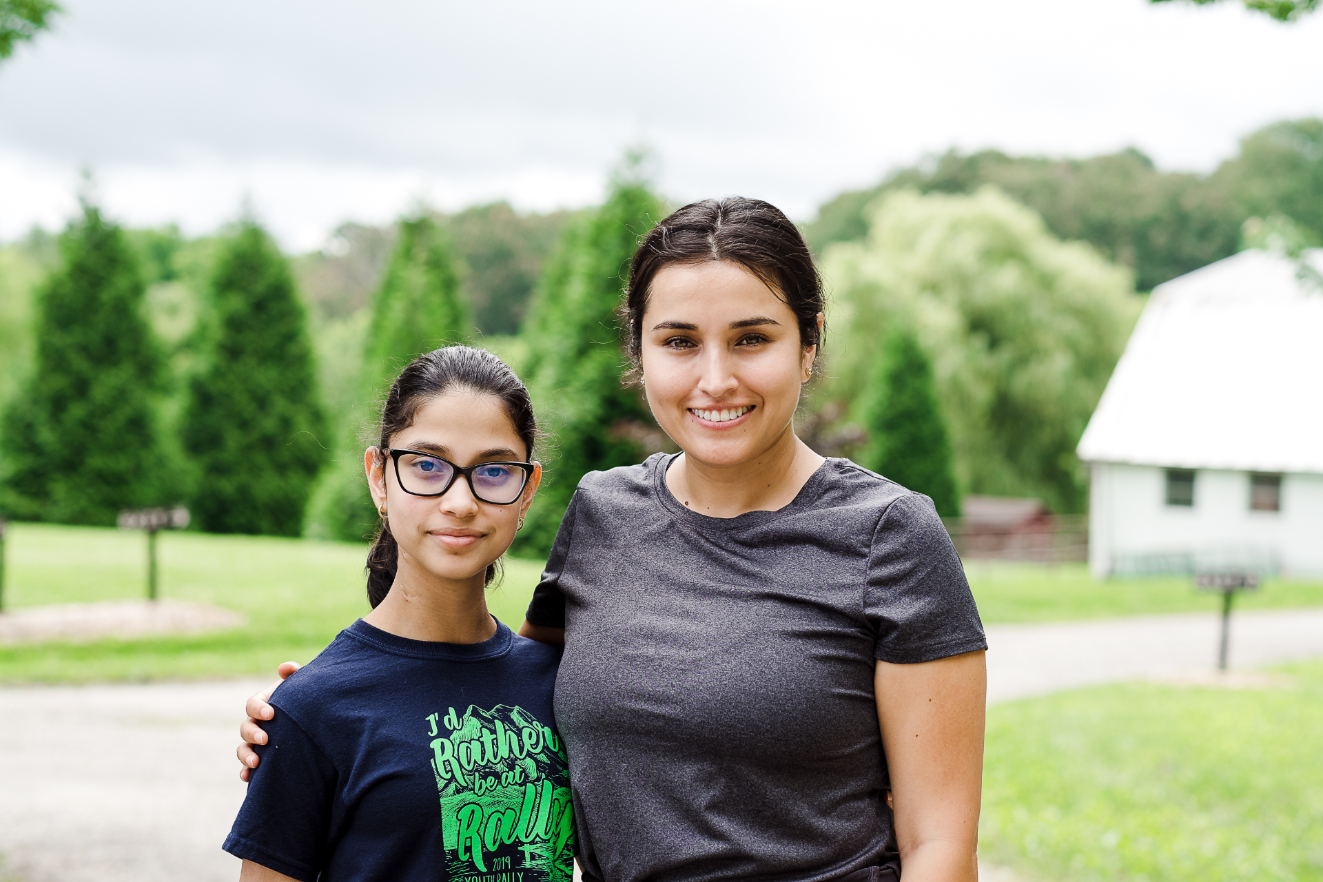 A Sisters Circle mentor and mentee smiling together outdoors